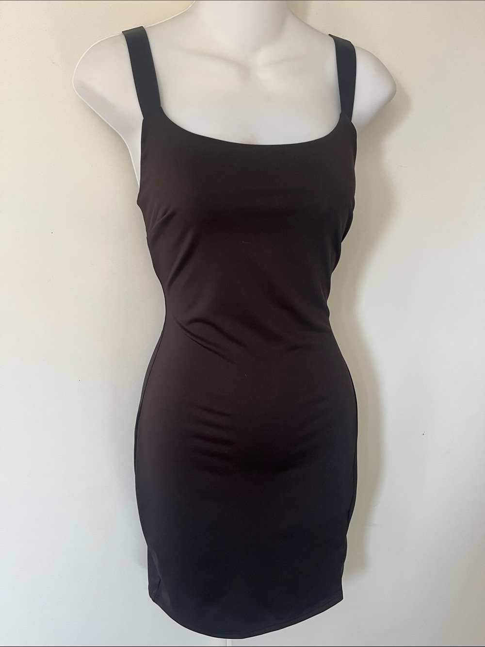 Black Bodycon Mini Dress with thick crisscross strap and bottom slit